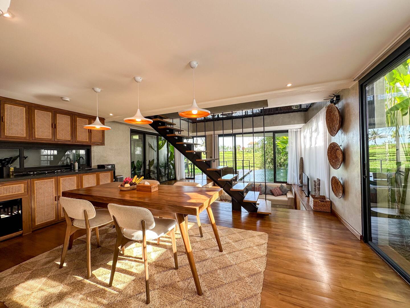 Open kitchen under warm pendant lights